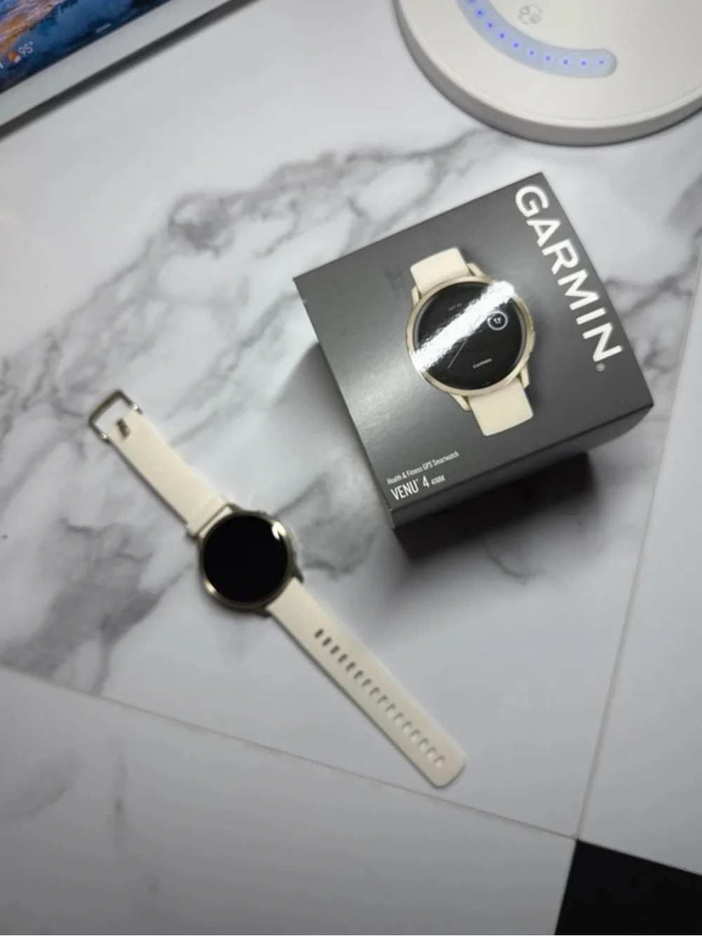 garmin Venu 4 Smartwatch in Cream and Gold